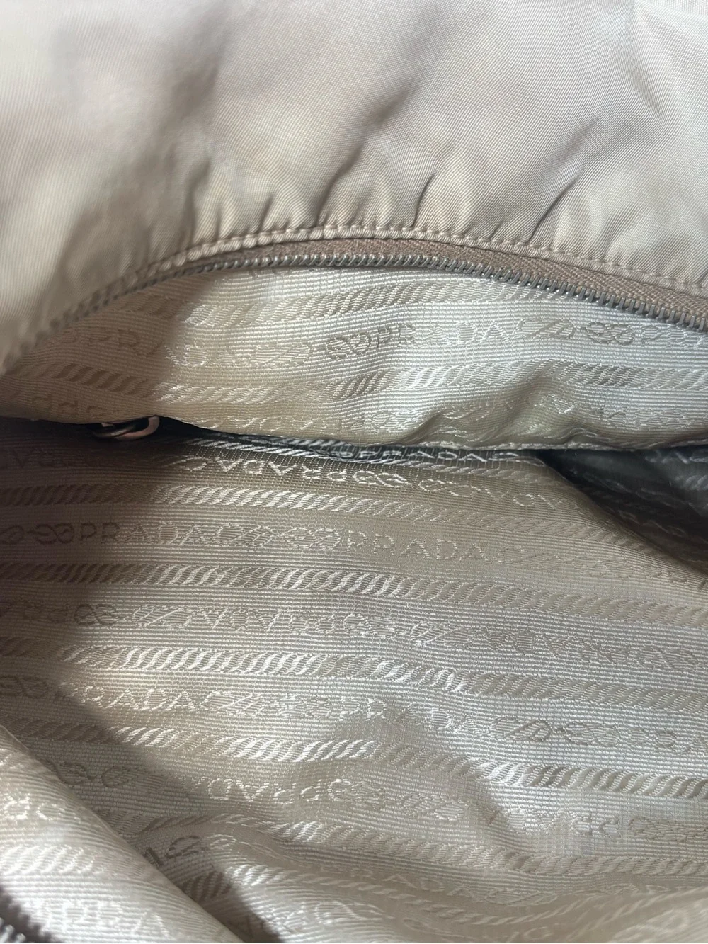 Vintage Prada Tessuto hobo bag crafted from beige/khaki nylon with leather strap
